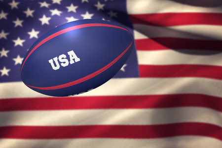 USA rugby ball against close-up of american flagの写真素材