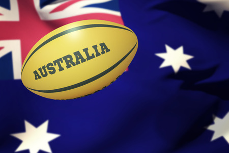 Australia rugby ball against close-up of australian flagの写真素材