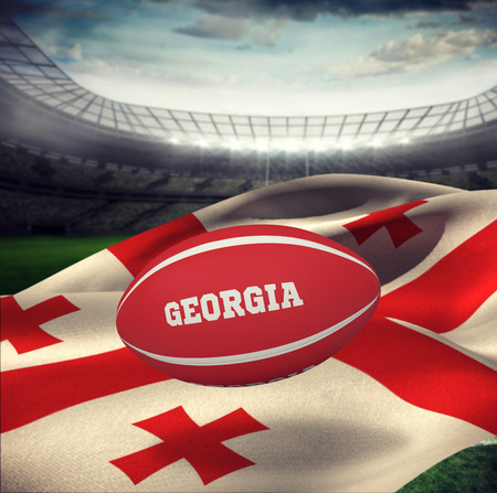 Georgia rugby ball against rugby stadiumの写真素材