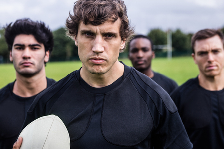 Rugby players standing together before match at the parkの写真素材