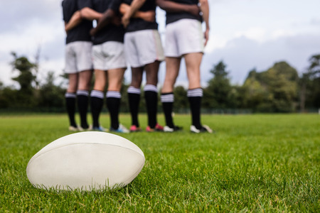Rugby players standing together before match at the parkの写真素材