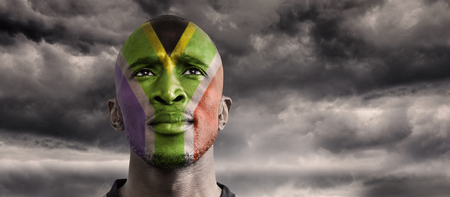 South AFrica rugby player against stormy skyの写真素材