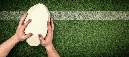 A rugby player scoring a try against pitch with lineの写真素材