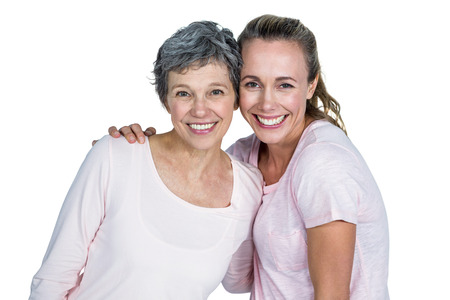 Portrait of cheerful mother and daughter against white background