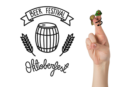 Oktoberfest character fingers against oktoberfest graphicsの写真素材