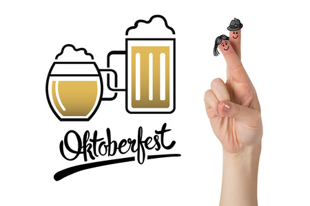 Oktoberfest character fingers against oktoberfest graphicsの写真素材