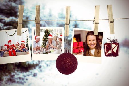 Hanging christmas photos against white steps leading to open doorの写真素材
