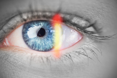 Close up of female blue eye on white backgroundの写真素材