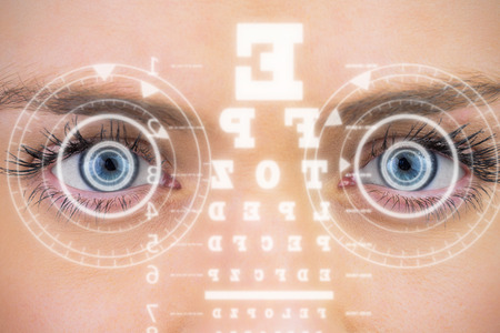 Close up of female blue eyes against interface