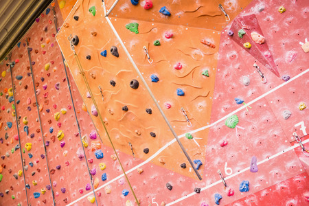 Rock climbing wall at the gymの写真素材