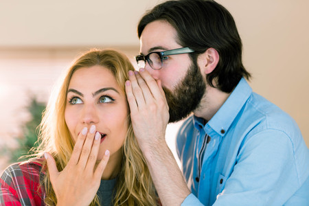 Creative team gossiping in casual officeの写真素材