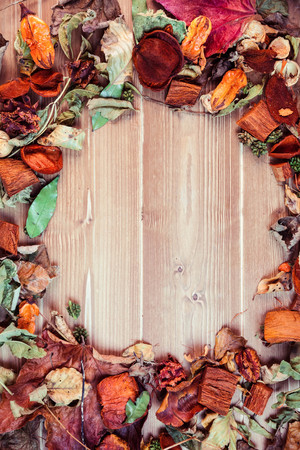 Autumnal leaf pattern on desk with copy spaceの写真素材