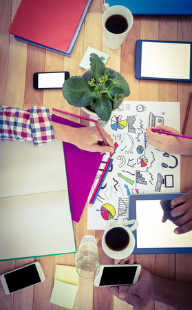 Young creative team working together in casual officeの写真素材