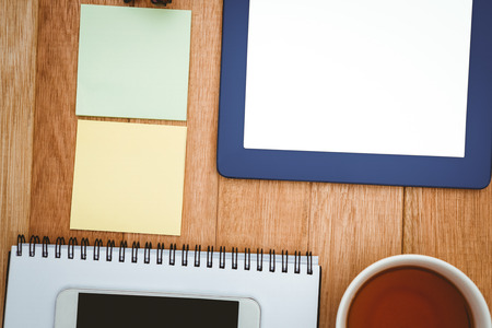 Close up view of business stuff on wood deskの写真素材
