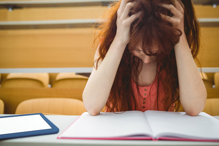 Mature student in lecture hall at the universityの写真素材