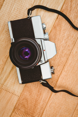 View of an old camera on wood deskの写真素材