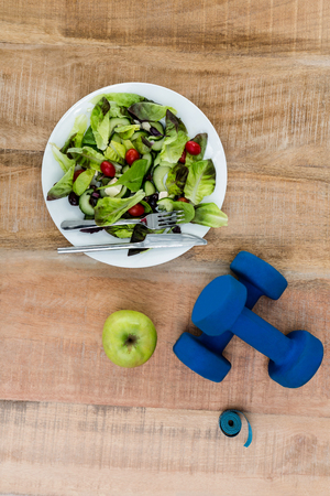 Ingredients for a healthy lifestyle on wooden tableの写真素材