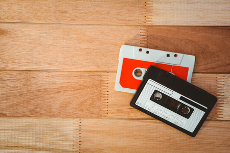 Close up view of old tapes on wood deskの写真素材