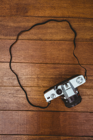 View of an old camera on wood deskの写真素材