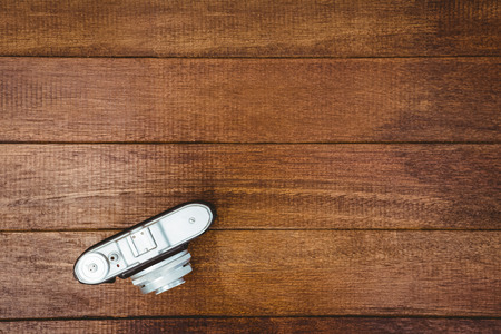View of an old camera on wood deskの写真素材