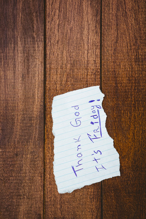 Close up view of a piece of paper on wood deskの写真素材