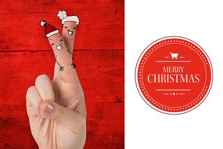 Christmas fingers against white background with vignetteの写真素材