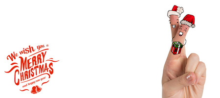 Christmas fingers against white background with vignetteの写真素材