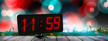 Time displayed on digital clock against digitally generated grey wooden planks
