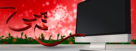 Ribbon in shape of christmas tree against painted blue wooden planksの写真素材