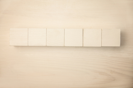Row of blocks on table shot in studioの写真素材