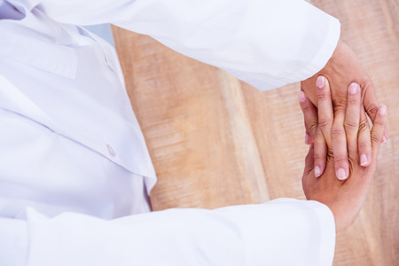 Businessman streatching his arms and handsの写真素材