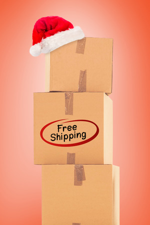 Stack of brown boxes against orangeの写真素材