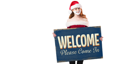 Festive redhead in foam beard holding poster against vintage open signの写真素材