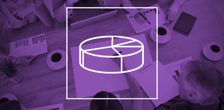 Digital image of pie chart against businesswoman working with colleagues in boardroomの写真素材