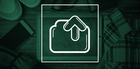 uploading file against hipsters deskの写真素材