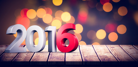 2016 graphic against close up of christmas lightsの写真素材