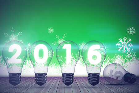 2016 with light bulb against room with wooden floor