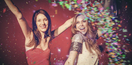 Colour curve against pretty friends dancing and smiling
