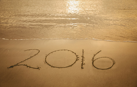 2016 on sand at beach near the water