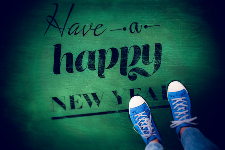 Casual shoes against green chalkboardの写真素材