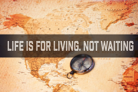 Motivational new years message against world map with compass showing north america