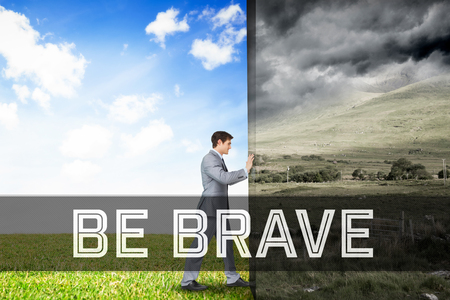Motivational new years message against composite image of businessman pushing away scene