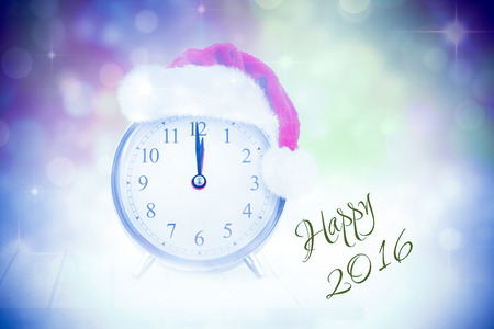 New years greeting against christmas baubles