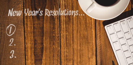 New years resolution list against view of a deskの写真素材