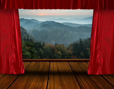 Red curtain pulling backの写真素材