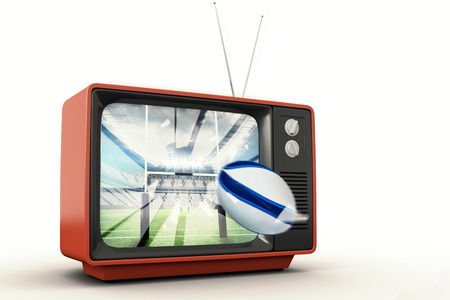 Rugby ball against rugby stadiumの写真素材