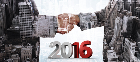 2016 graphic against composite image of close up on two businesspeople shaking hands