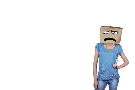 Woman posing with bag on head against white background with vignetteの写真素材