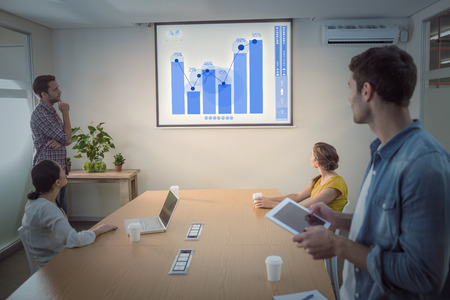 Percentages graphical representation against creative business team making presentation
