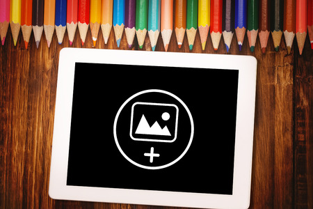 Photography apps against students desk with tablet pcの写真素材